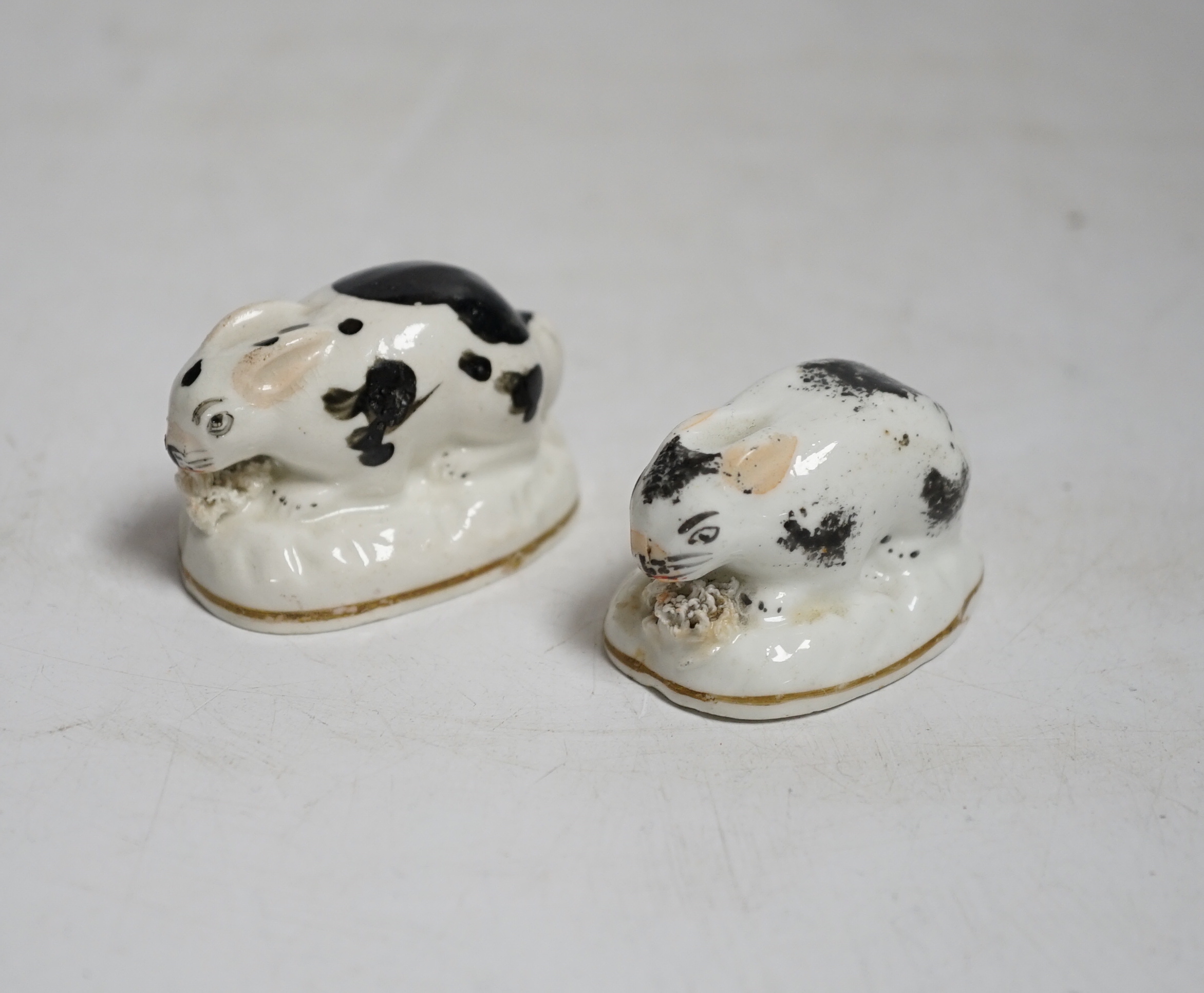 Two Staffordshire porcelain toy models of rabbits, c.1830–50, Provenance: Dennis G. Rice collection, 5 cms wide.